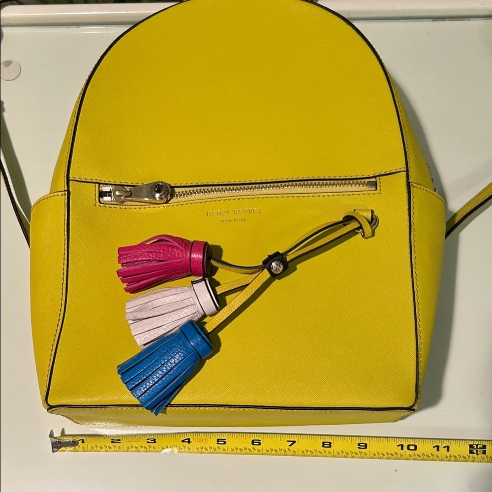Henri Bendel West 57th Yellow Saffiano Leather Backpack with Colorful Tassels